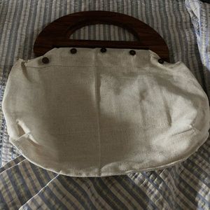 Bermuda Bag handle and inert .I have a duplicate otherwise I would keep it